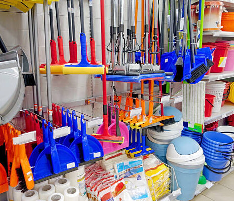 Household goods for the house cleaning at the counter in a supermarket in the store